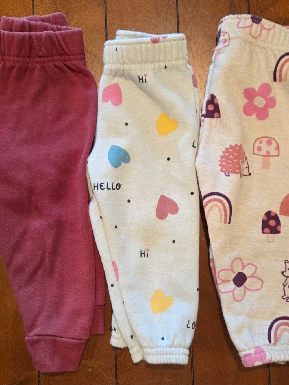 3 Gently Used Garanimals Pink Hedgehog, Hearts, & Solid Jogger Pants 6-9M